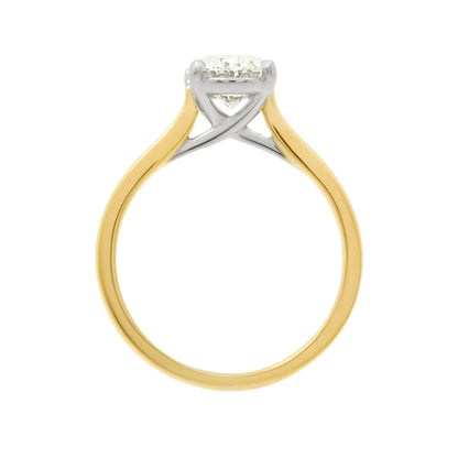 Round Solitaire With Criss Cross Shank in yellow and white gold