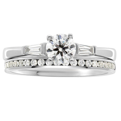 Round Solitaire With Tapered Baguettes made from white gold with a diamond wedding ring