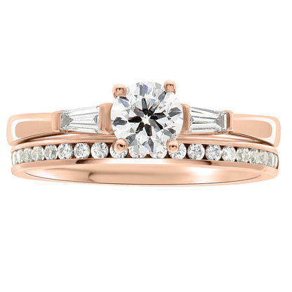 Round Solitaire With Tapered Baguettes made from rose gold with a diamond wedding ring