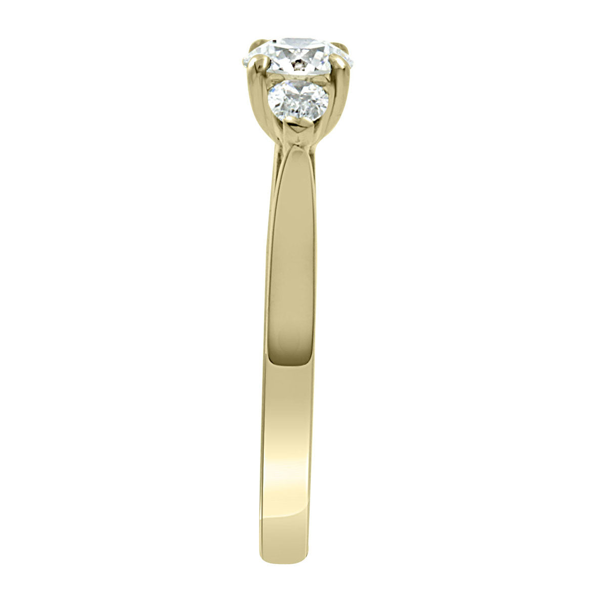 Round and Pear Diamond Ring in yellow gold in side view
