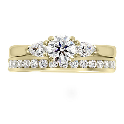 Round and Pear Diamond Ring in yellow gold with a diamond wedding ring