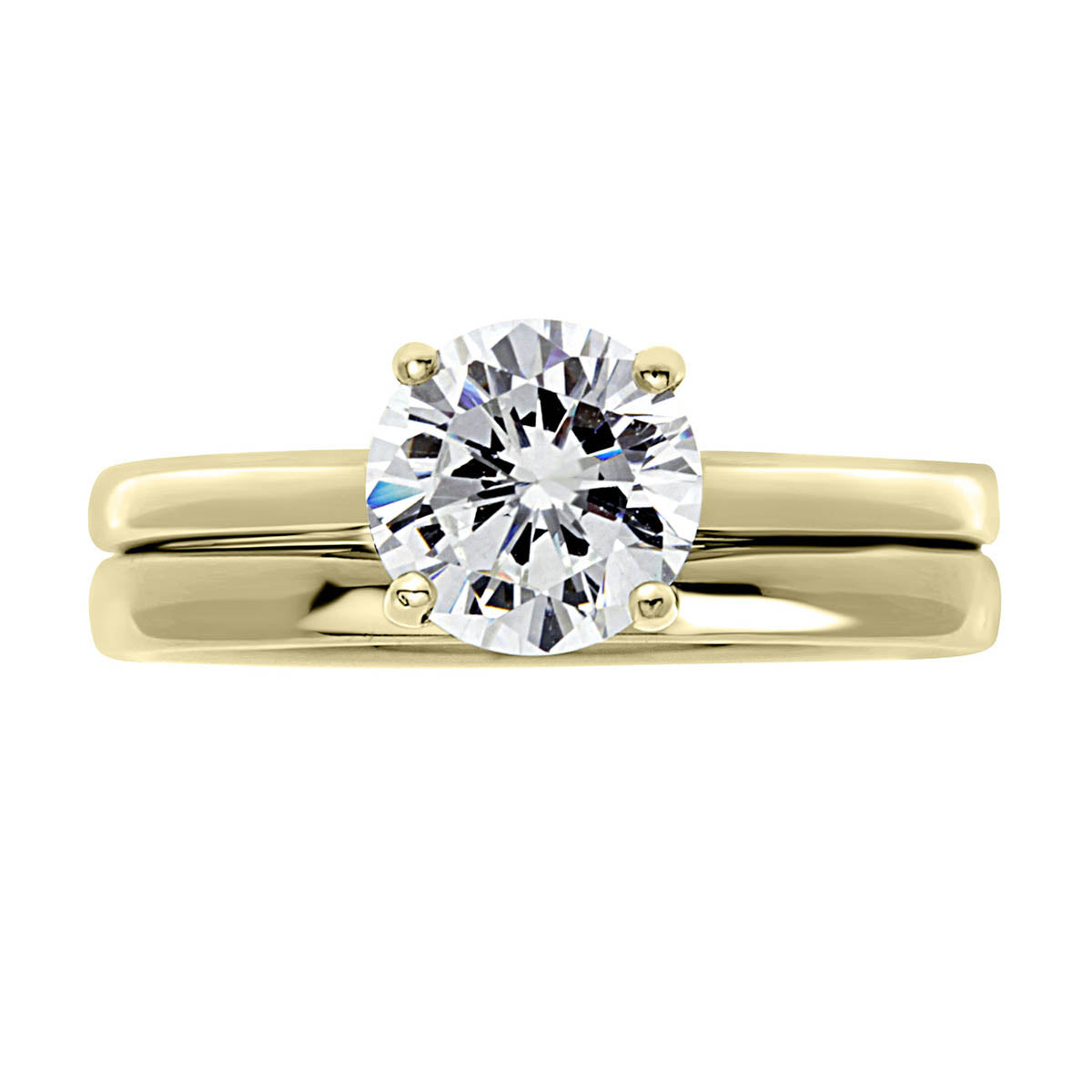 Solitaire Engagement Ring in yellow gold pictured with a plain wedding ring