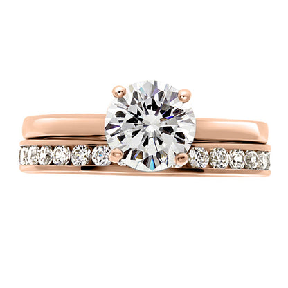 Solitaire Engagement Ring in rose gold pictured with a diamond wedding ring