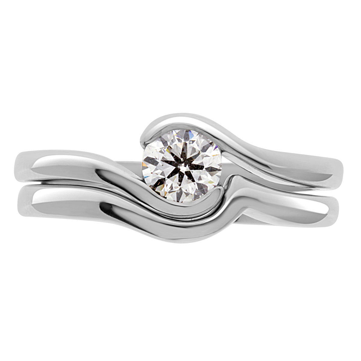Tension Set Diamond Ring made in white gold with a matching wedding ring