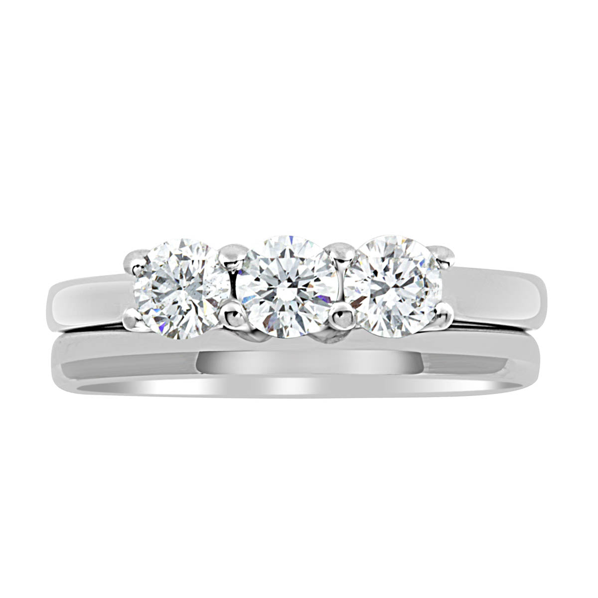 Three Stone Engagement Ring made of white gold with a plain wedding ring