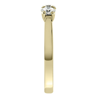 Three Stone Engagement Ring made of yellow gold in an end view