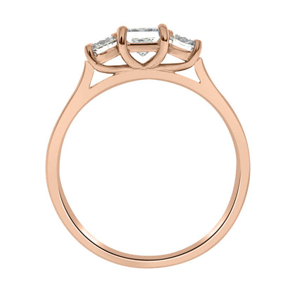 Three Stone Princess Cut Diamond Ring made from rose gold standing in an upright position