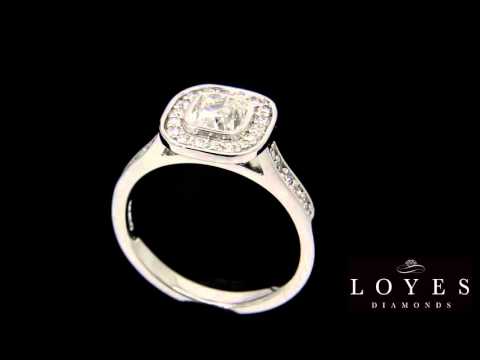 Cushion Cut Bezel Diamond Ring in white gold revolving with black background