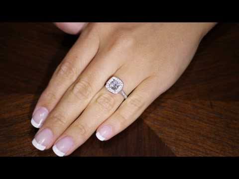 Cushion Cut Diamond Antique Diamond Ring in white gold on a ladies hand