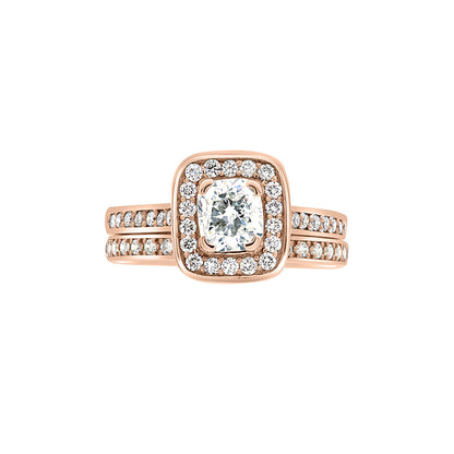 Cushion Cut Diamond Ring in rose gold with a matching diamond set wedding ring