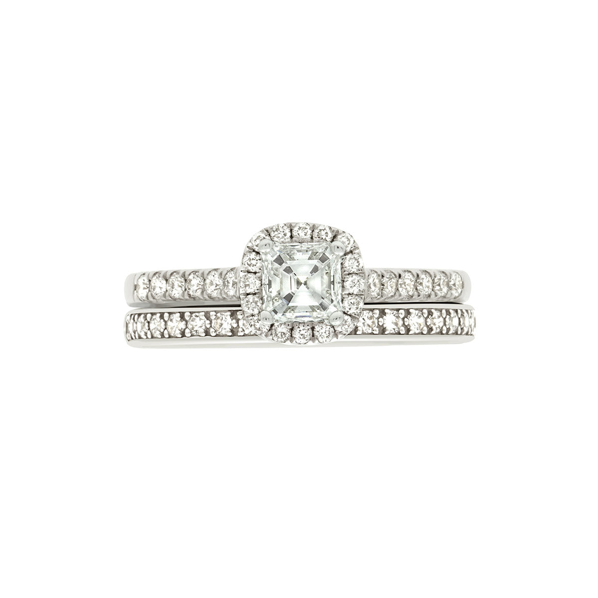 Asscher Halo Diamond Ring in white gold pictured with a diamond wedding ring