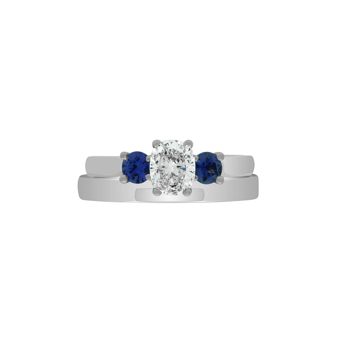 Diamond Sapphire Trilogy set in white gold metal with a matching white gold plain wedding ring