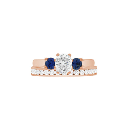 Diamond Sapphire Trilogy set in rose gold pictured with a rose gold and diamond wedding ring