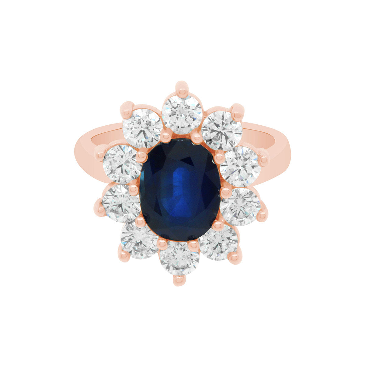 Sapphire Engagement Ring in rose gold with a cluster of sparkling white diamonds