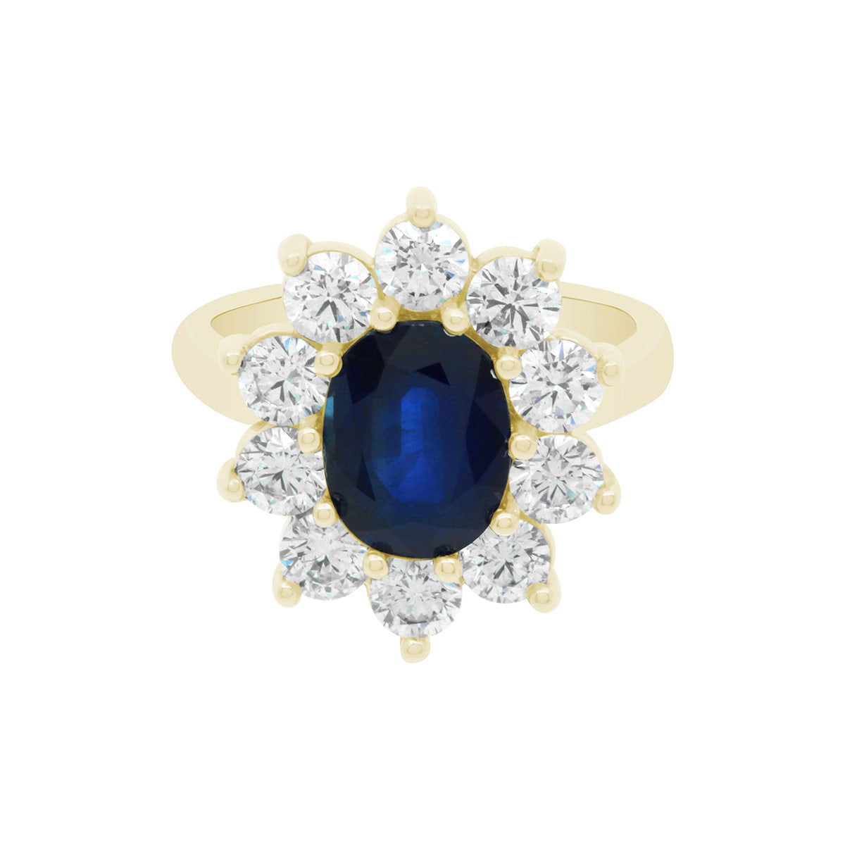 Sapphire Engagement Ring in yellow gold with a cluster of sparkling white diamonds