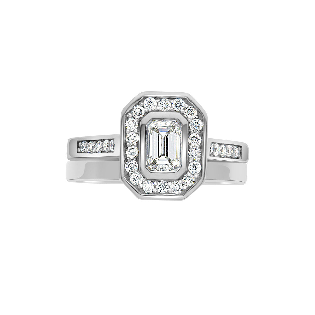 Emerald Cut Halo Ring in white gold with a matching wedding ring