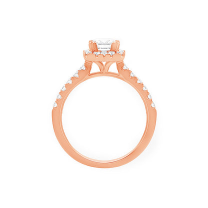 Emerald Shape Halo Ring In Rose Gold in a vertical standing position