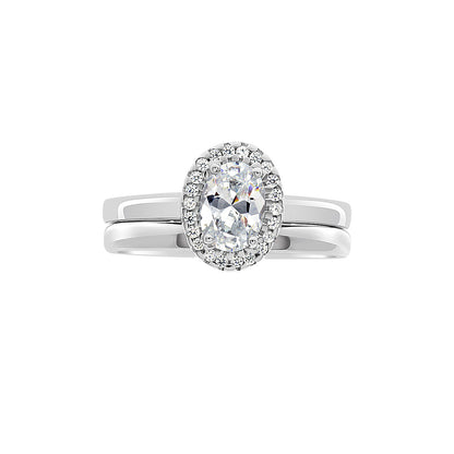 Oval Vintage Engagement Ring in white gold with a matching plain white gold wedding ring