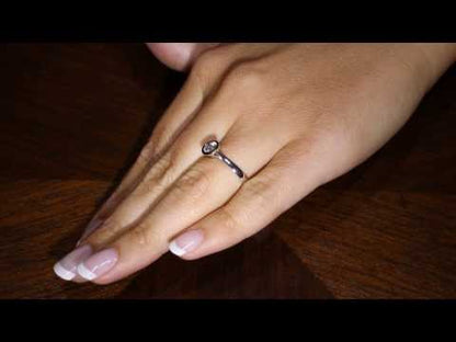  video of a Bezel Set Engagement ring on a woman&