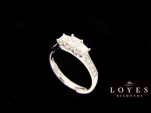 video of a Princess Cut Trilogy Engagement Ring with a black background