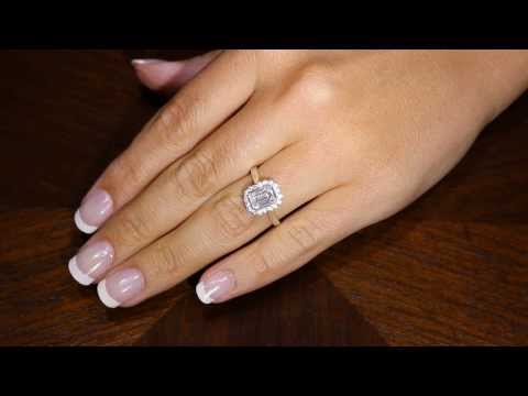 Video of Emerald Halo Engagement Ring in white gold on a lady&