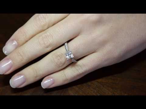 Princess Cut Diamond Solitaire With Tapered Diamond Shoulders on a woman&