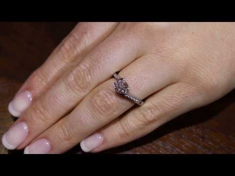 Four Claw Twist Engagement Ring In White Gold on a lady&