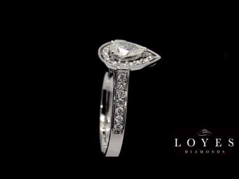 Pear Shaped Halo Engagement Ring in white gold, revolving to a black background