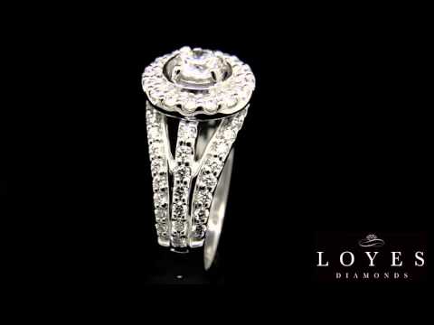 A video of a Three Band Engagement Ring in white gold and with a black background