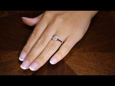 Round Vintage Engagement Ring in white gold on a womans hand