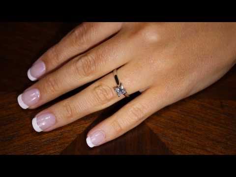 Video of Princess Cut Solitaire in white gold on a lady&