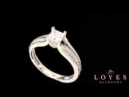 Princess cut diamond engagement ring in white gold on a black background