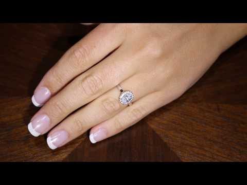  Oval Halo Diamond Ring in white gold on a ladies ring finger