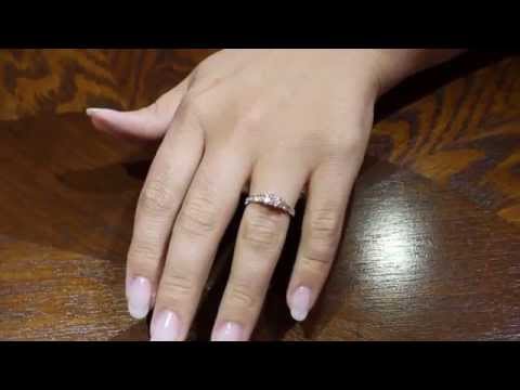 video of a Princess Cut Trilogy Engagement Ring on a womans hand