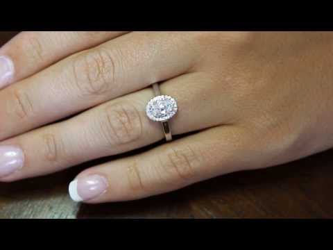 Oval Vintage Engagement Ring in white gold on a ladies finger