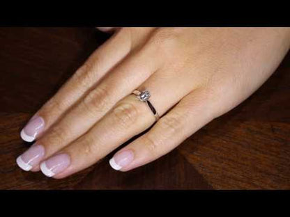 video of an Emerald Cut Ring Solitaire Engagement Ring in white gold on a lady&