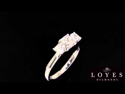 video of Three Stone Asscher Cut in white gold with a black background
