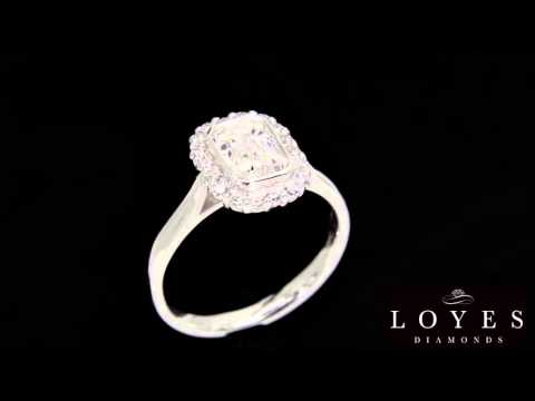 Video of Emerald Halo Engagement Ring in white gold on a black background
